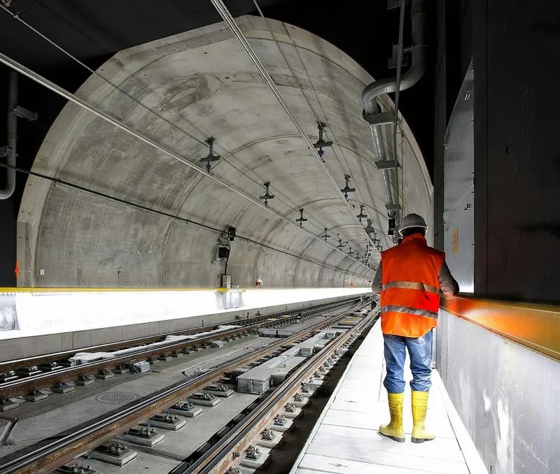 Man standing in a train underground