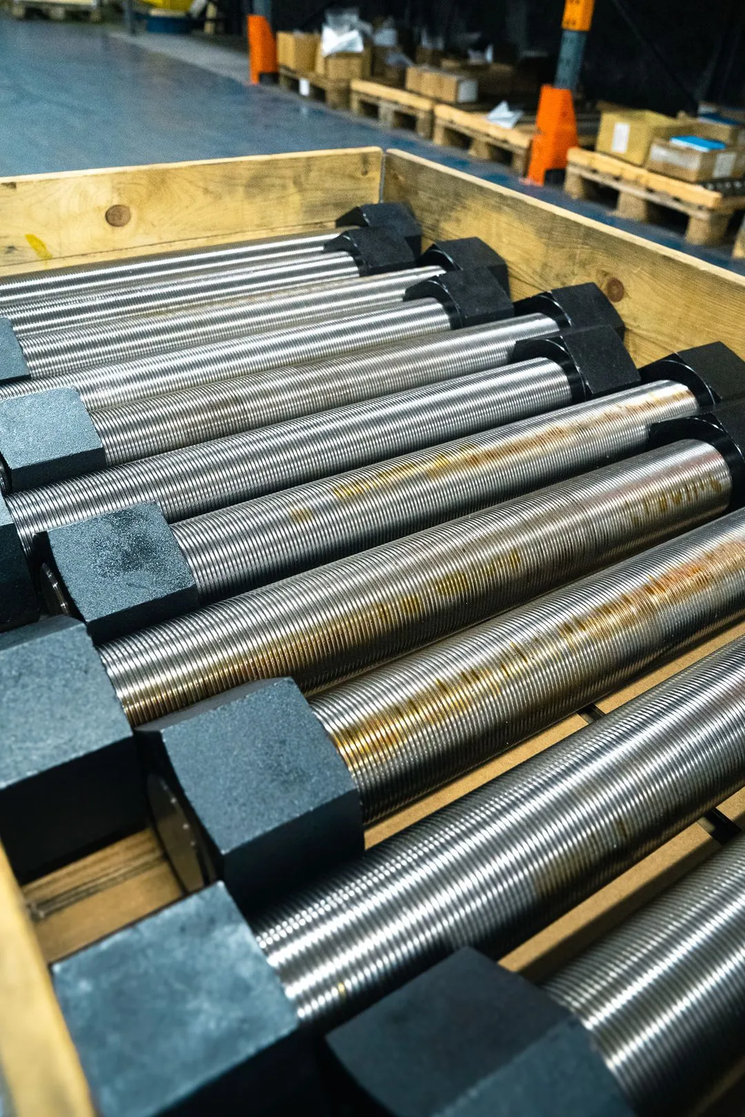 Picture of heavy bolts stacked up