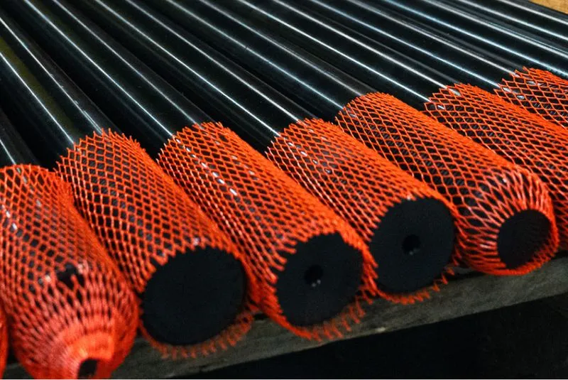 A pile of rods stacked up
