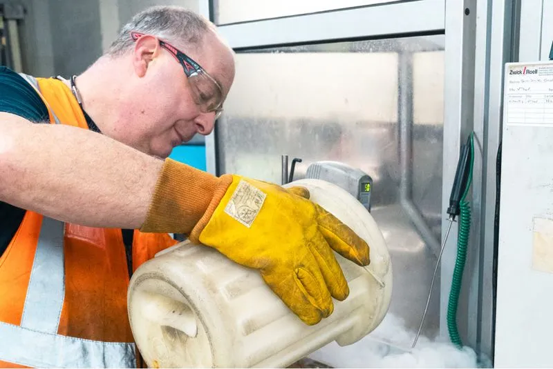 A man pouring dry ice